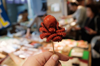 Tako-tamago, a quail egg-stuffed baby octopus on a skewer,