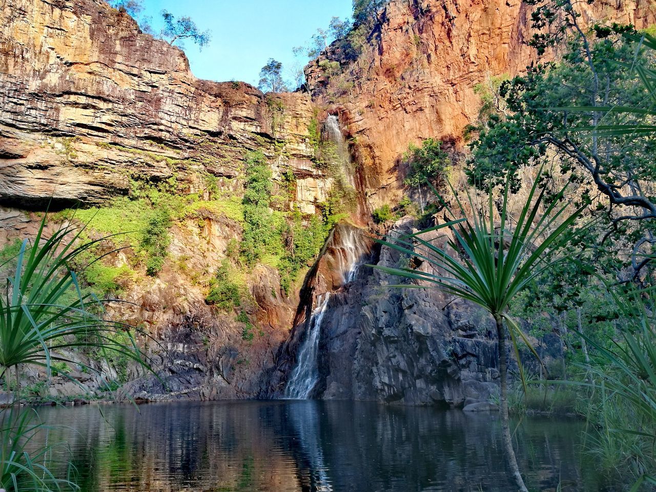 rock formation, rock - object, tranquil scene, beauty in nature, nature, scenics, geology, tranquility, physical geography, day, water, mountain, tree, river, outdoors, no people, travel destinations, cliff, sky