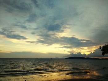 Scenic view of sea against sky at sunset