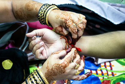 High angle view of woman holding hands