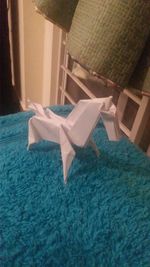 Low section of clothes drying on paper at home