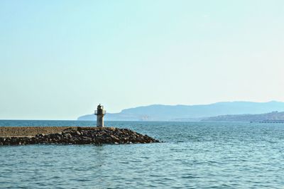 Scenic view of sea against clear sky