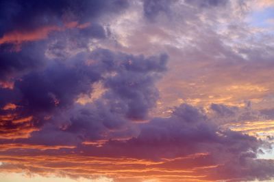 Low angle view of dramatic sky during sunset