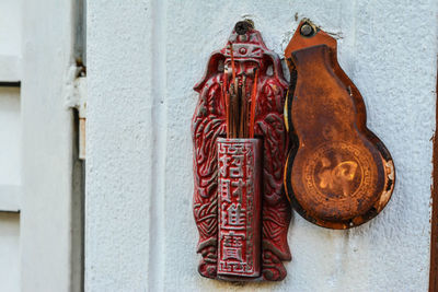 Close-up of clothes hanging on wall