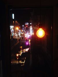 Illuminated street light at night