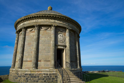 Low angle view of built structure against sky