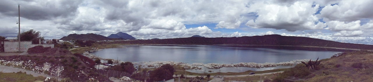 panoramic, water, tranquil scene, scenics, cloud - sky, tranquility, lake, beauty in nature, mountain, sky, mountain range, nature, non-urban scene, distant, cloudy, outdoors, day, wide, calm, wide shot, remote, countryside, majestic, solitude, no people