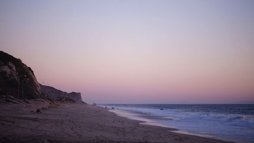 Scenic view of sea against clear sky