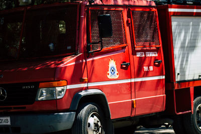 Red vintage car in city