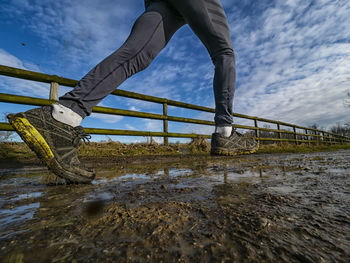 Running on a muddy trail