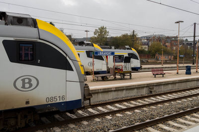 Train on railroad tracks against sky