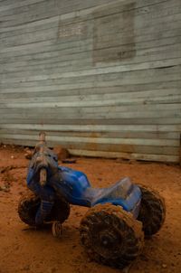 Dirty tricycle on mud