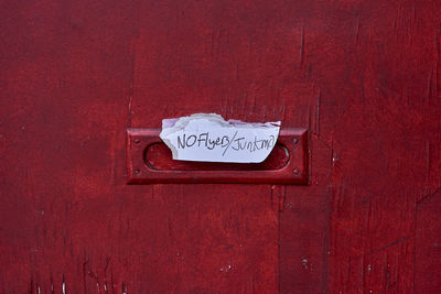 Close-up of text on door