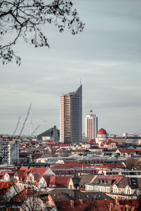 Modern buildings in city against sky