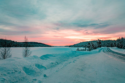 Scenic view of landscape against sky during sunset