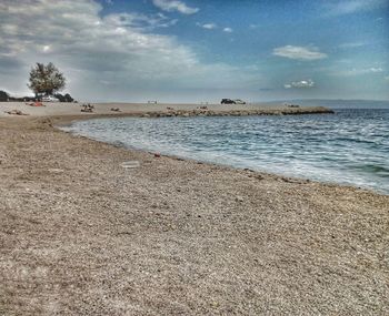 Scenic view of beach against sky