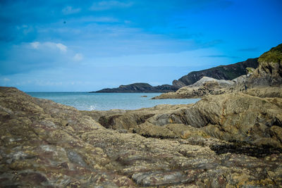 Scenic view of sea against blue sky
