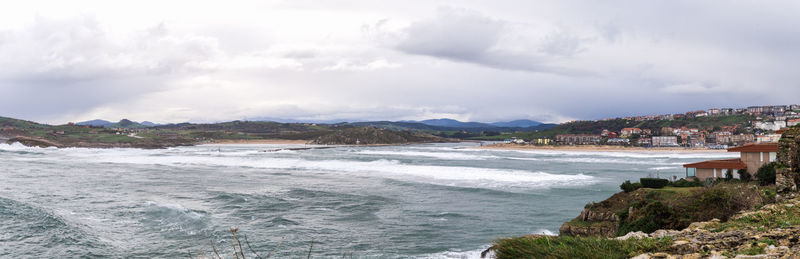 Scenic view of beach against sky