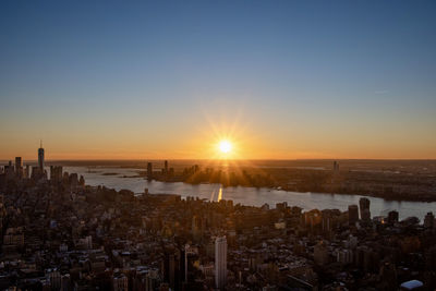 High angle view of townscape against sky during sunset