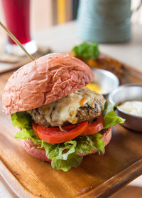 Close-up of burger in plate on table