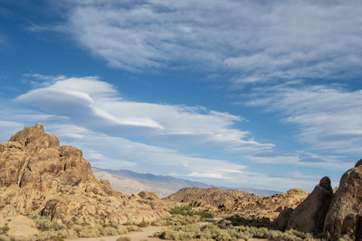 Rock formations in desert against sky