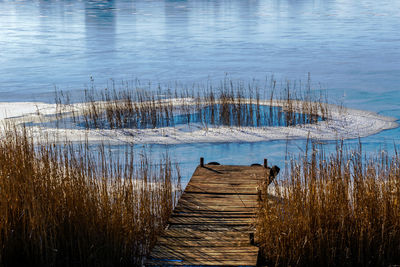 Wooden pier in lake