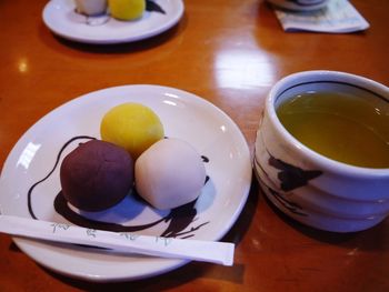 High angle view of eggs in plate on table