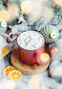 Cozy winter and christmas setting with hot cocoa and homemade cookies