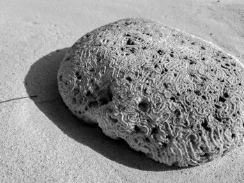 Close-up of sand on table