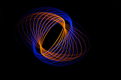 Light painting against black background