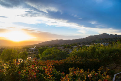 Scenic view of landscape against sky during sunset