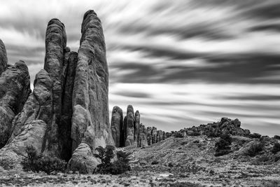 Panoramic view of rock against sky