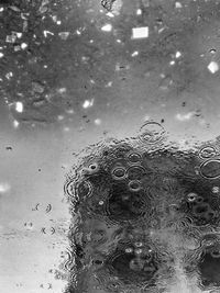 Close-up of water drops on glass