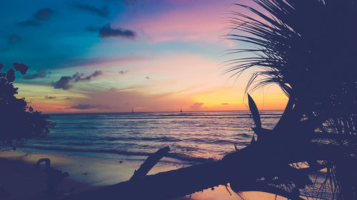 Scenic view of sea against sky at sunset