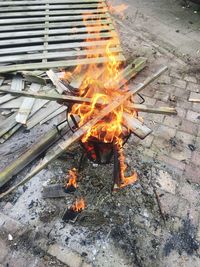 High angle view of bonfire on barbecue grill