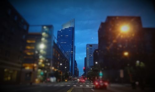 View of city lit up at night