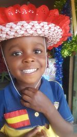 Portrait of smiling girl wearing hat