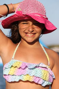 Portrait of happy girl wearing hat