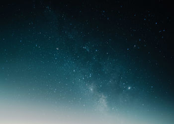 Low angle view of star field against sky at night