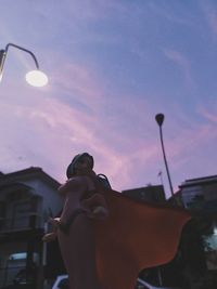 Low angle view of silhouette statue against sky during sunset