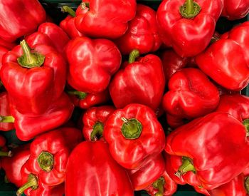 Full frame shot of red bell peppers at market stall