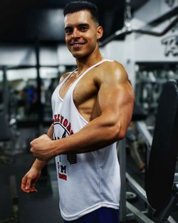 Young woman exercising in gym