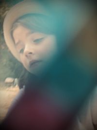 Portrait of young woman looking away