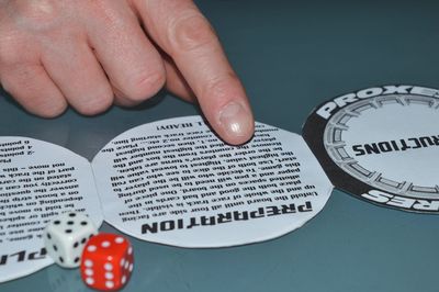 Close-up of hand on table