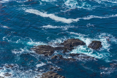 Full frame shot of rocks in sea