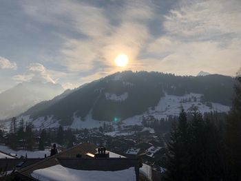 Scenic view of mountains against sky during sunset