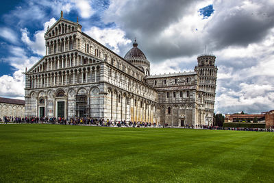 Unique view of piazza dei miracoli with cathedral and leaning tower of pisa, tuscany, italy