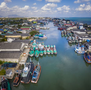 Aerial view of fishery boat floating at river pier in rayong eastern of thailand