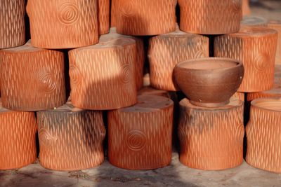 Earthenware and wood during sunny day