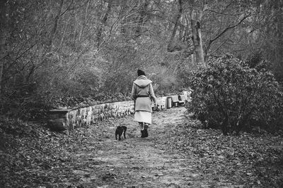 Woman standing on field
